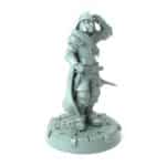 3D-printed miniature of a young male human city guard standing at attention